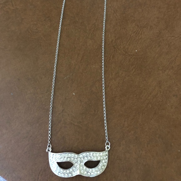 Jewelry - Costume jewelry mask on chain chain is about 12 to 18 inches silver mask